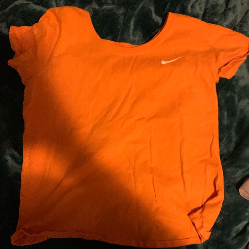 Orange Nike shirt